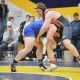 Grady Fey of Redfield, left, attempts to take down Lucas Rowland of Ipswich-Bowdle in their 285-pound match at the Region 1B tourney last Saturday in Volga. Both wrestlers will be competing in the State B tourney in Rapid City. Photo by Heather Bode